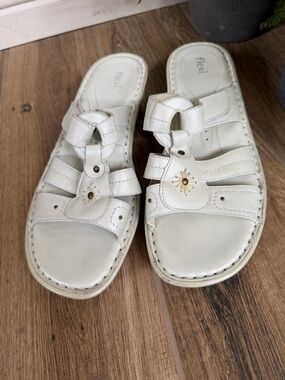 Flexi Women's White Leather Slide Sandals with Gold Sunburst Detail